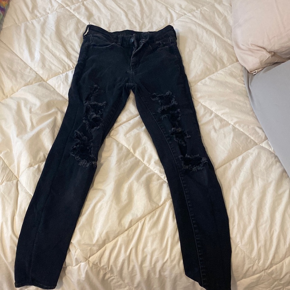 Ripped black skinny jeans